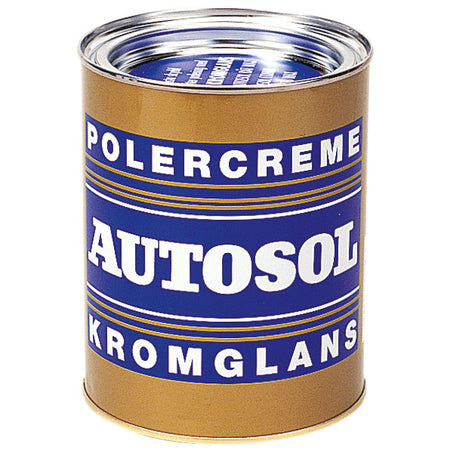 Autosol polermiddel på hvid baggrund, sikkerhedsetikette synlig.