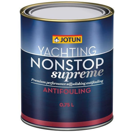 Grå bundmaling fra Jotun i en 2.5 liters spand, stående på bord.