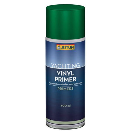 Jotun vinyl primer spray placeret på et arbejdsbord med værktøj.