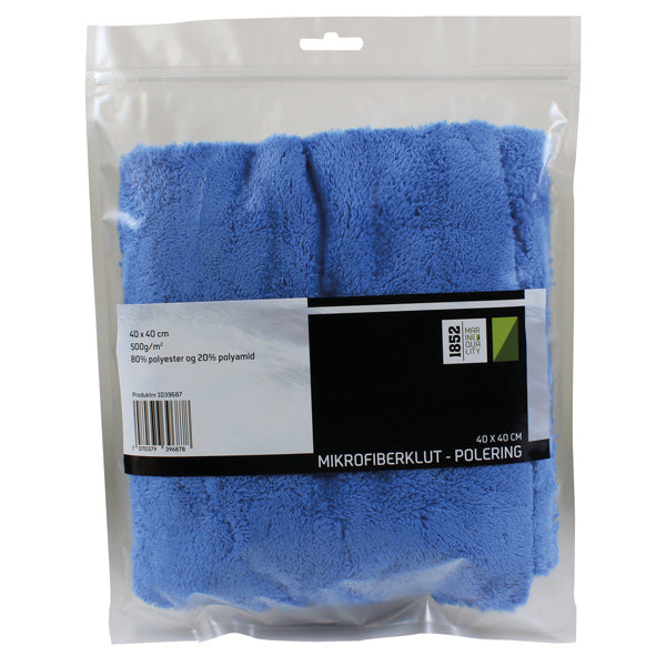1852 poleringsklud i blå farve, let foldet og placeret på en bordflade