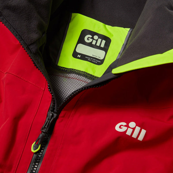 Gill OS32J jakke i rød, detaljeret nærbillede af stoffet og lynlåsen